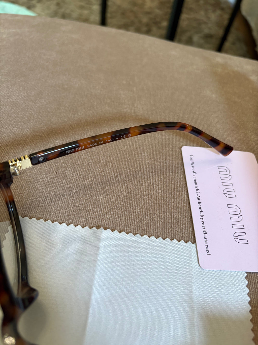 Miu Miu MU 04ZS women’s sunglasses