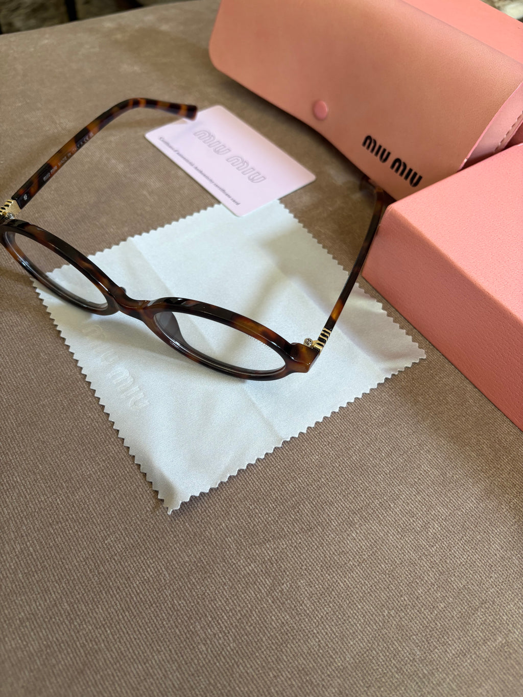 Miu Miu MU 04ZS women’s sunglasses