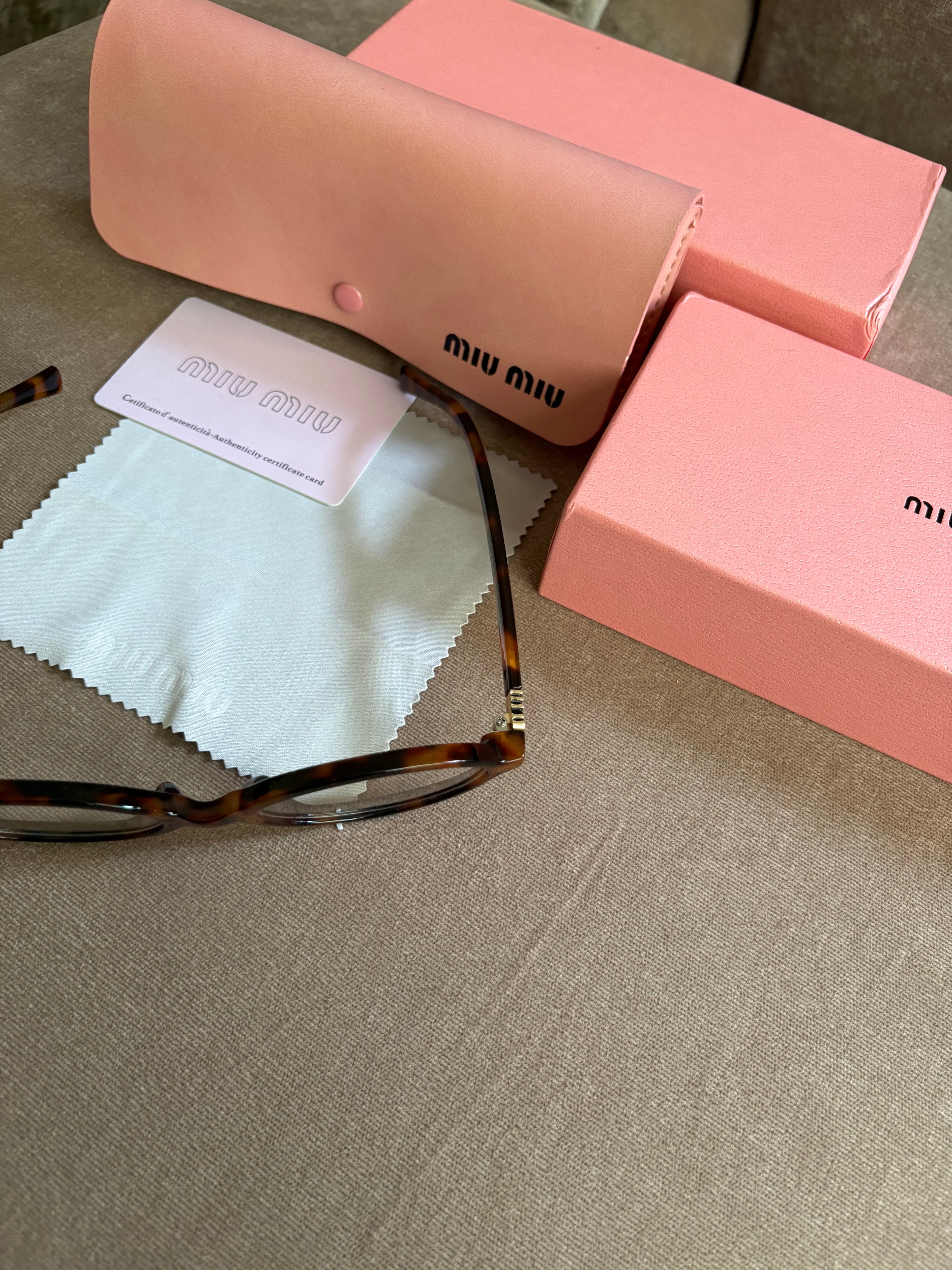Miu Miu MU 04ZS women’s sunglasses