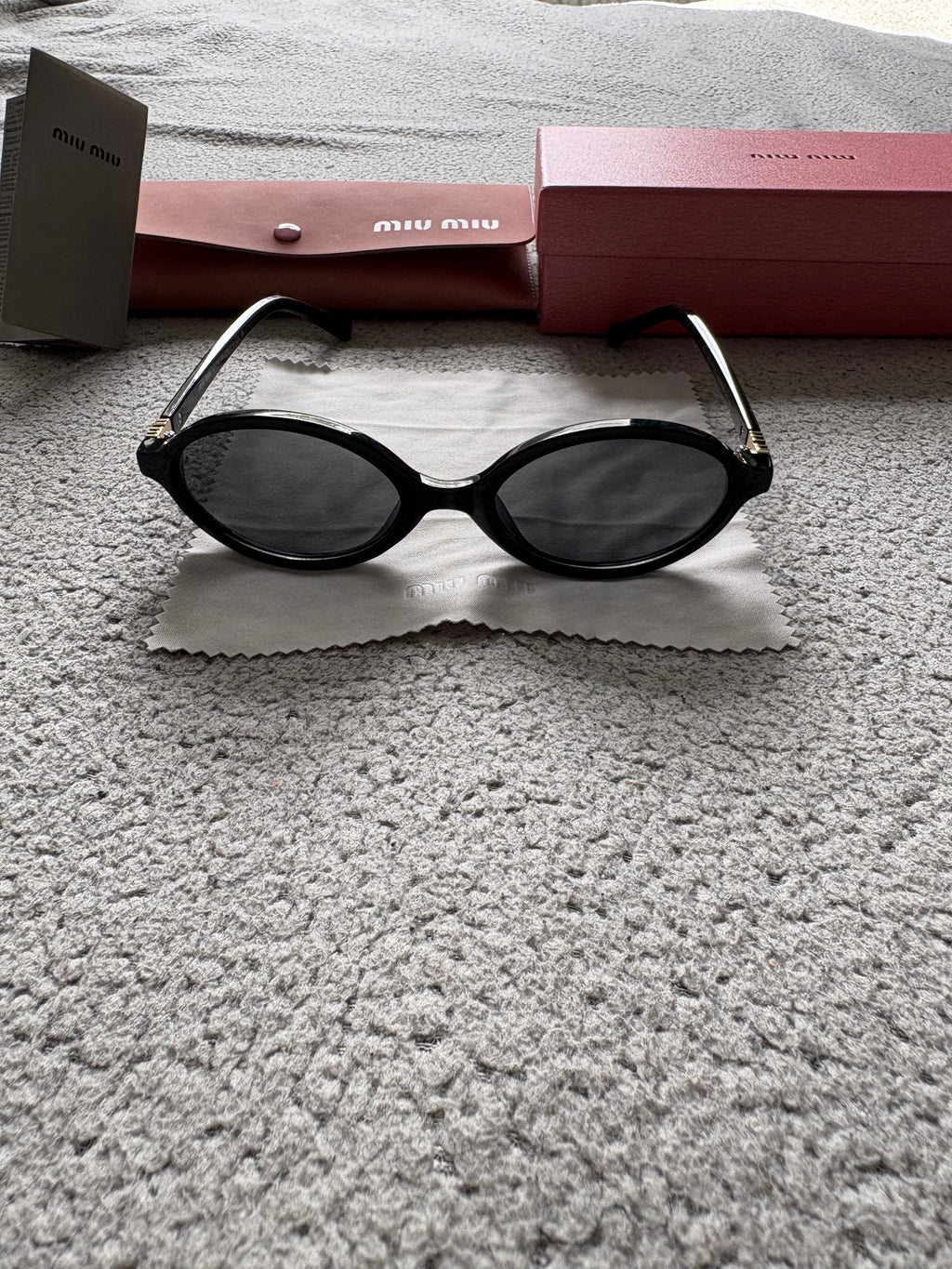 Miu Miu MU 04ZS women’s sunglasses