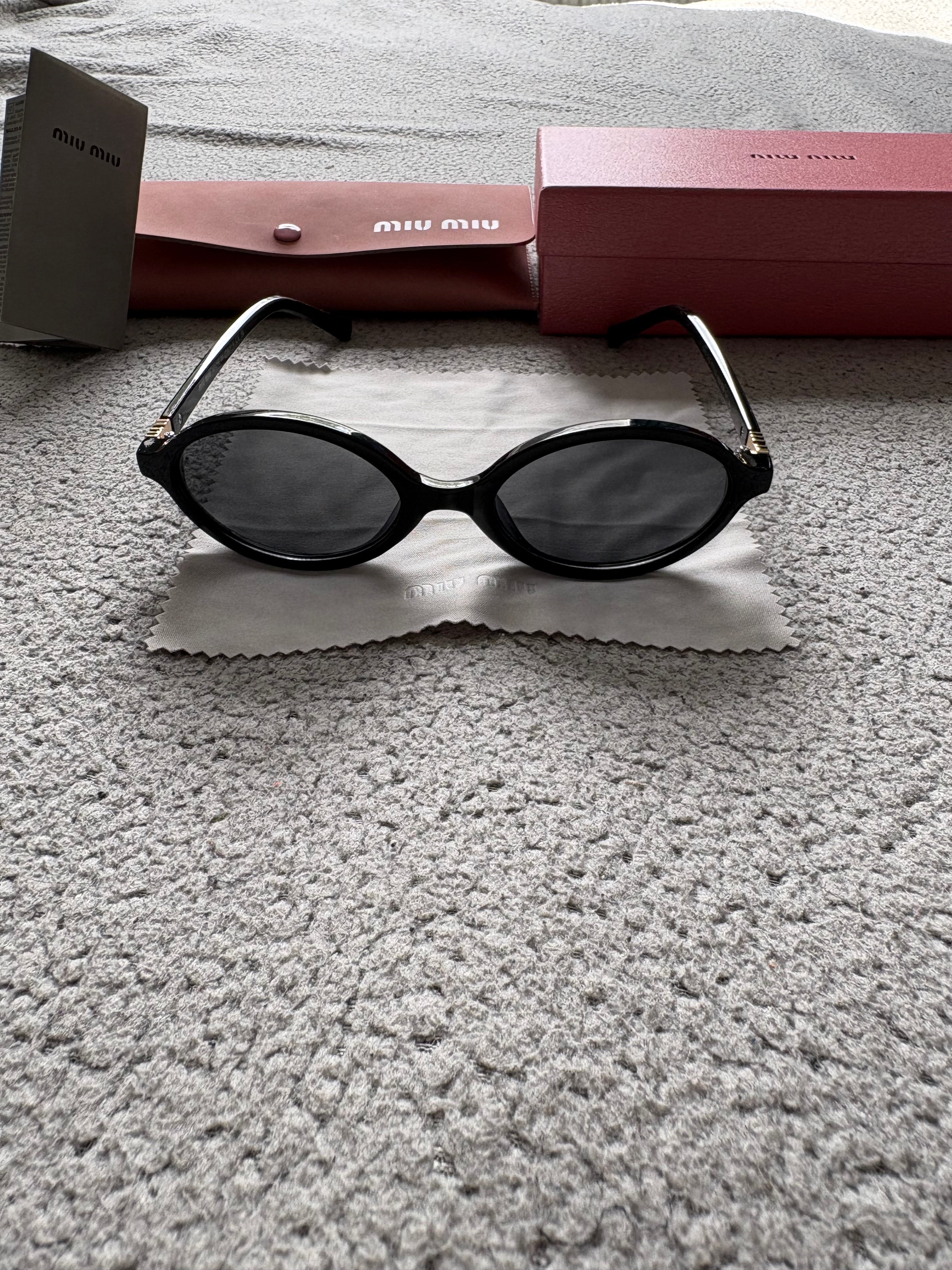 Miu Miu MU 04ZS women’s sunglasses