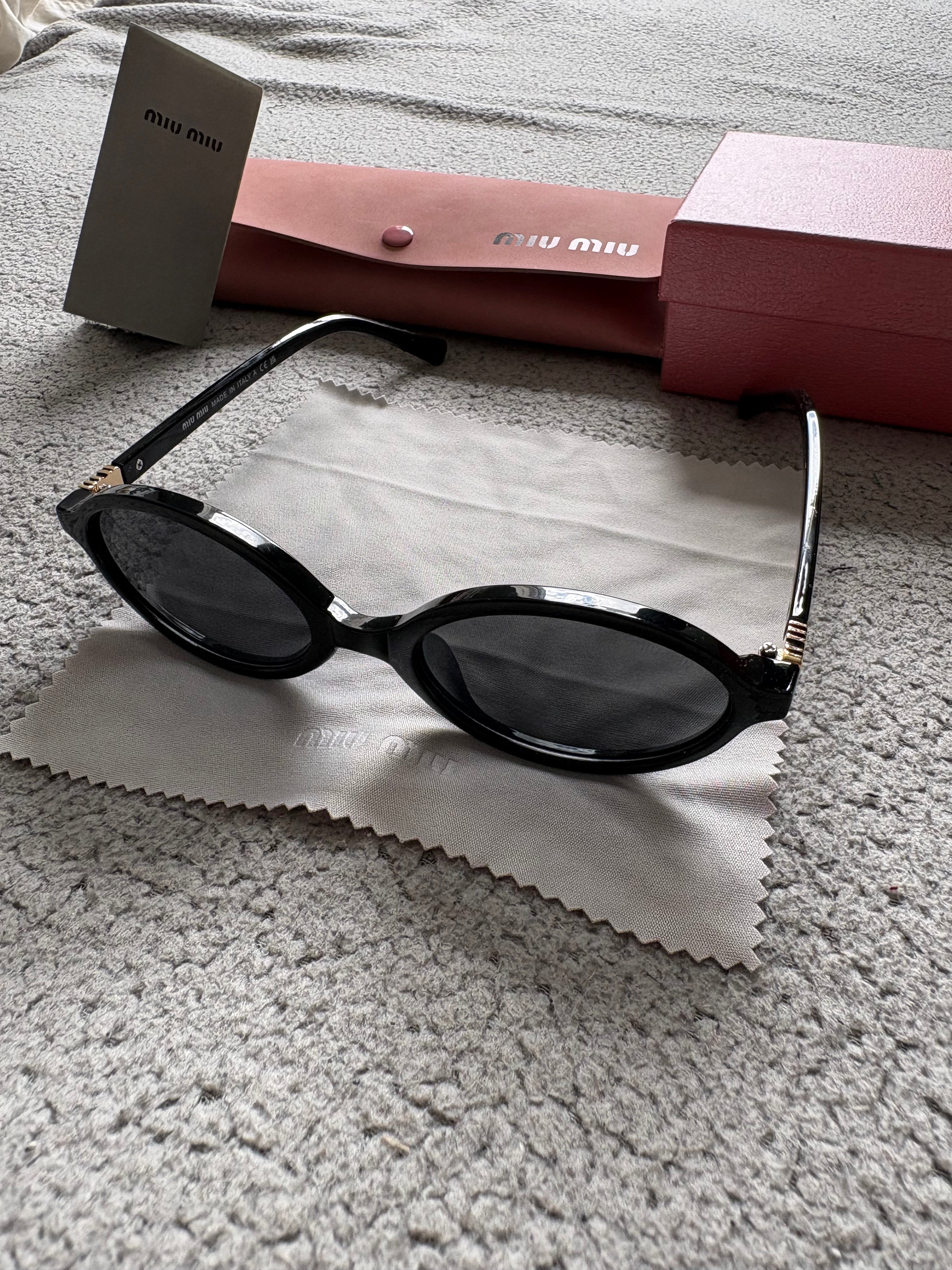 Miu Miu MU 04ZS women’s sunglasses