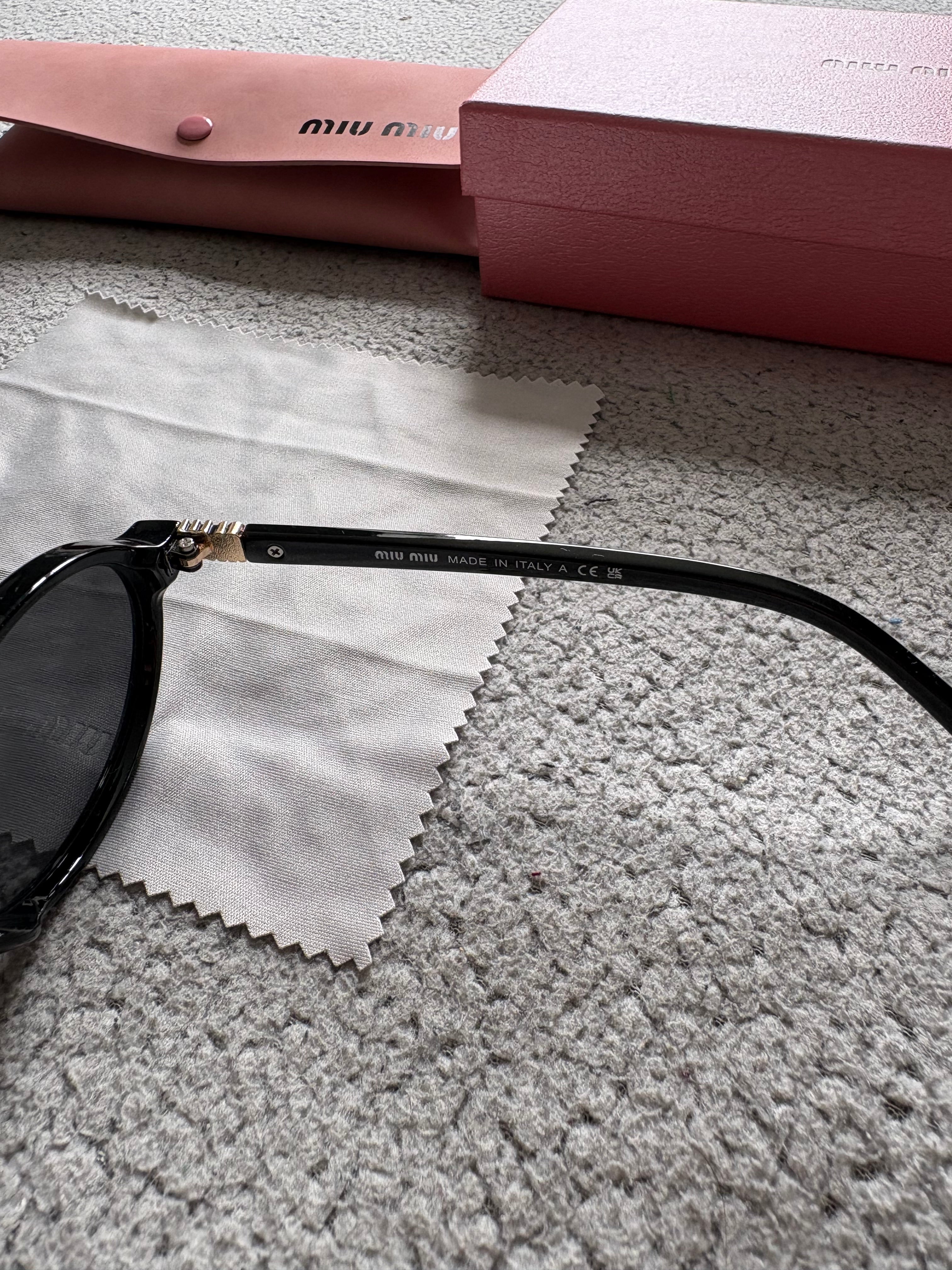 Miu Miu MU 04ZS women’s sunglasses