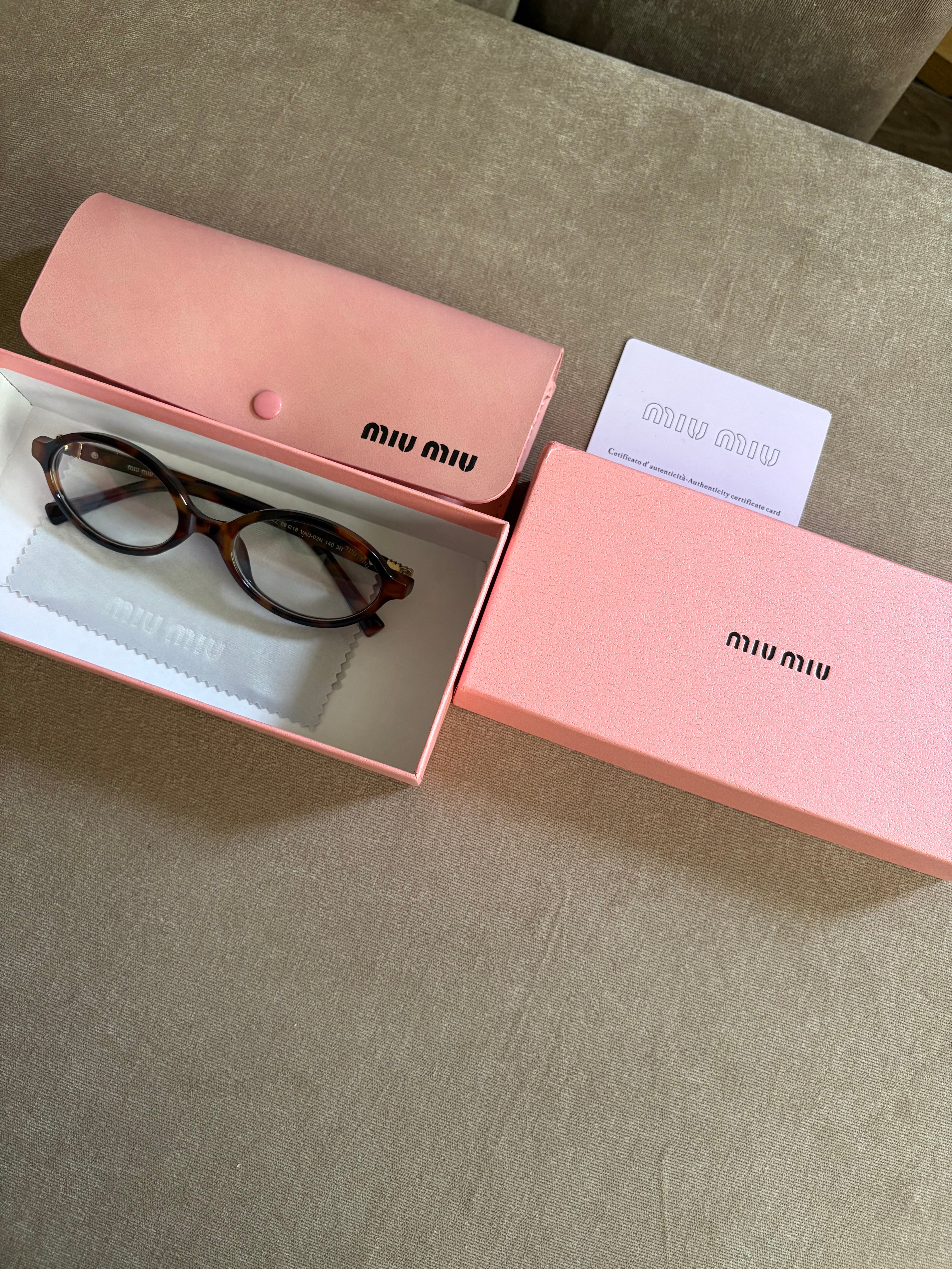 Miu Miu MU 04ZS women’s sunglasses