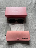Miu Miu MU 04ZS women’s sunglasses