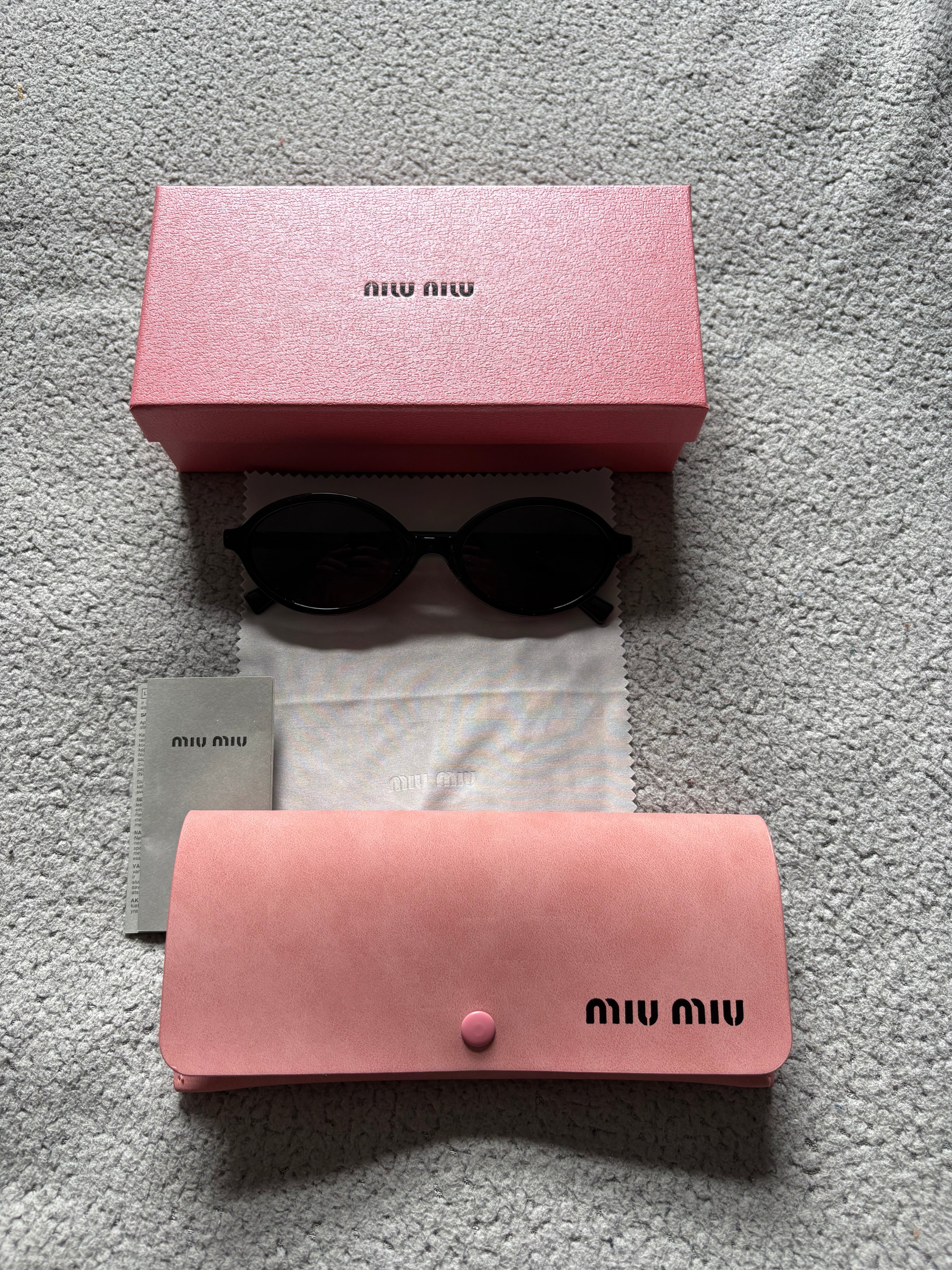 Miu Miu MU 04ZS women’s sunglasses