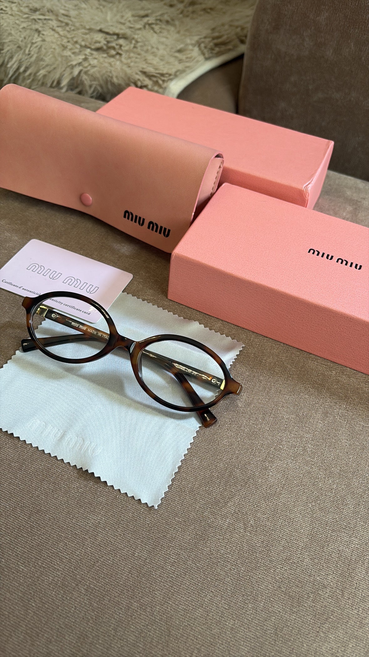 Miu Miu MU 04ZS women’s sunglasses