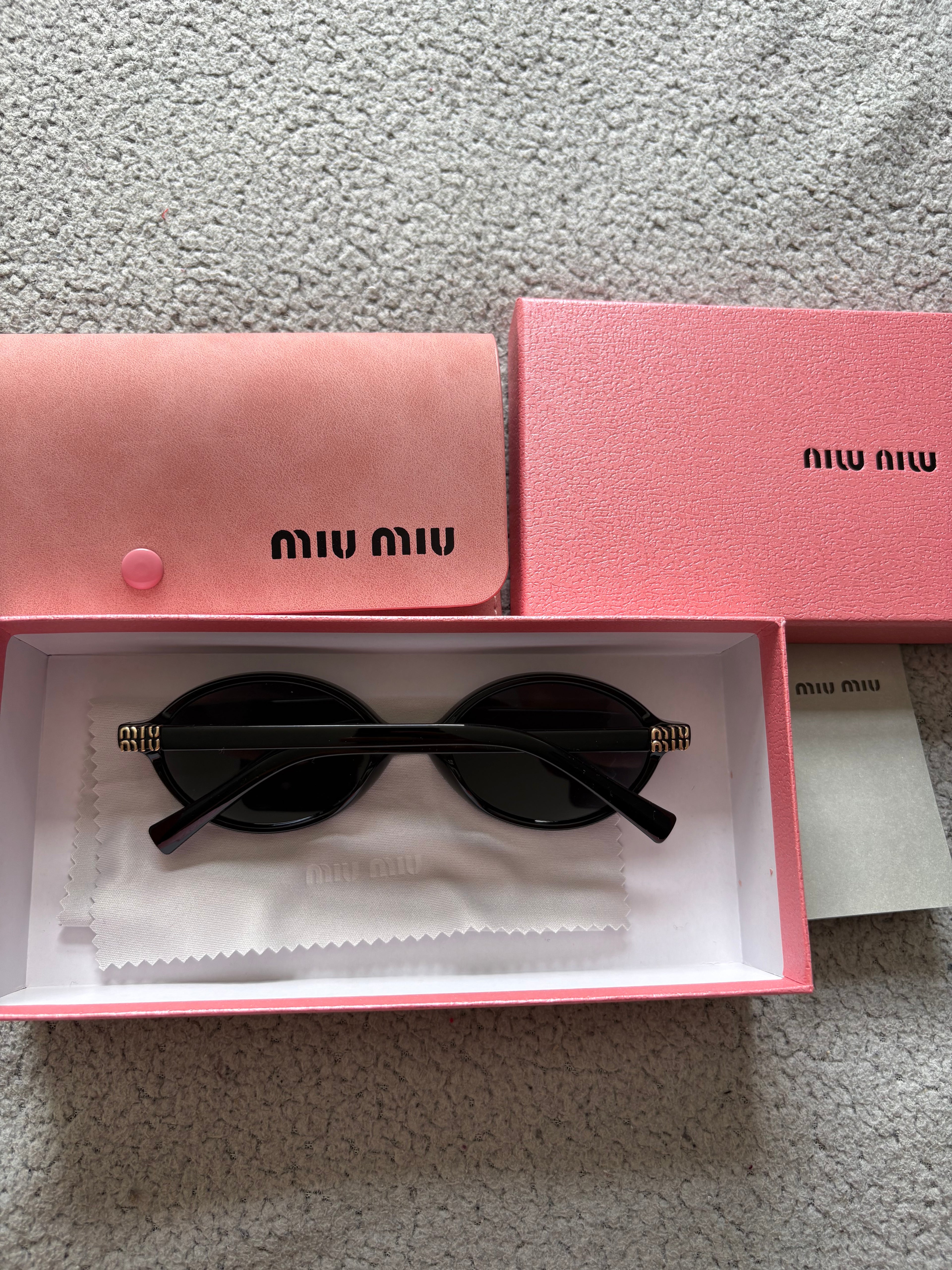 Miu Miu MU 04ZS women’s sunglasses