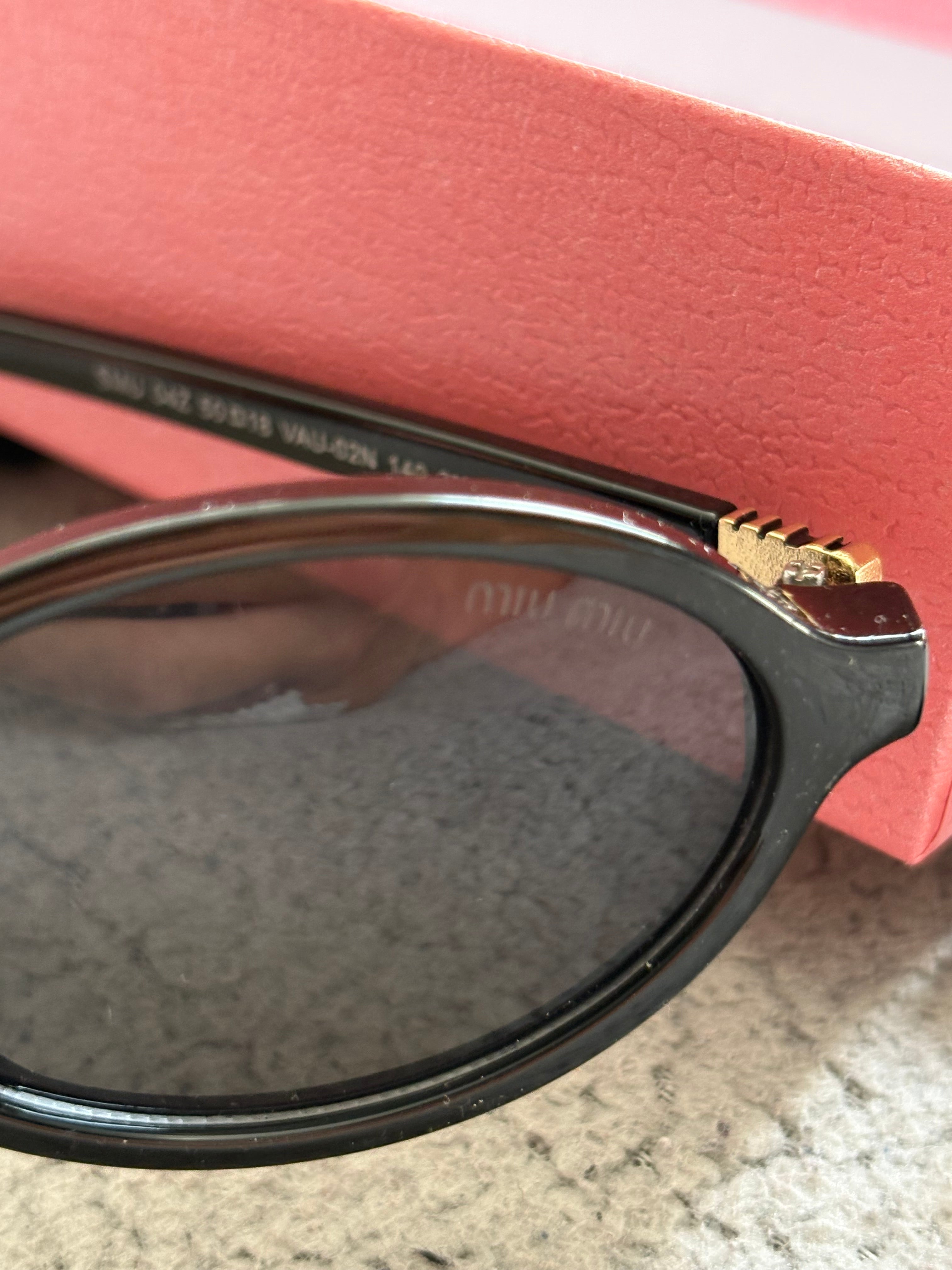 Miu Miu MU 04ZS women’s sunglasses