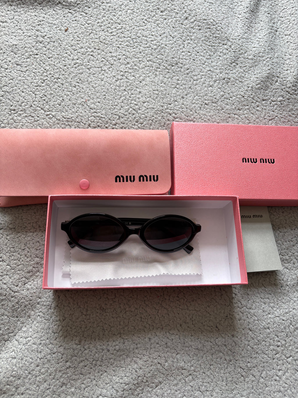 Miu Miu MU 04ZS women’s sunglasses